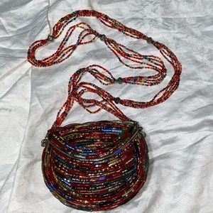 Like new Tara Hard case glass beaded colorful mini bag